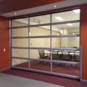 Glass sectional overhead door inside a commercial building