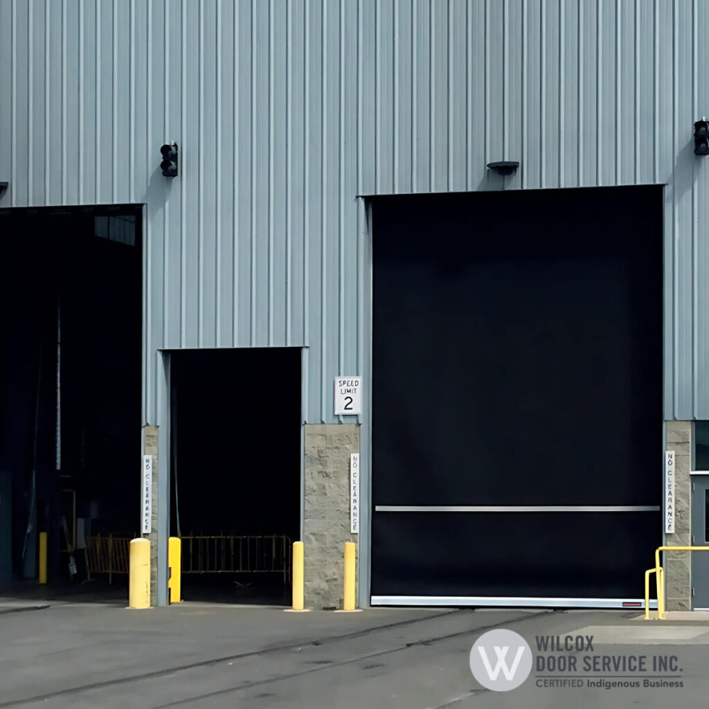 Rubber doors with yellow safety bollards